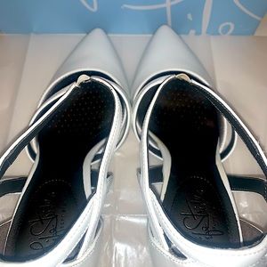 Never Worn & In Perfect Condition! These heels are a size 8.5 Wide.